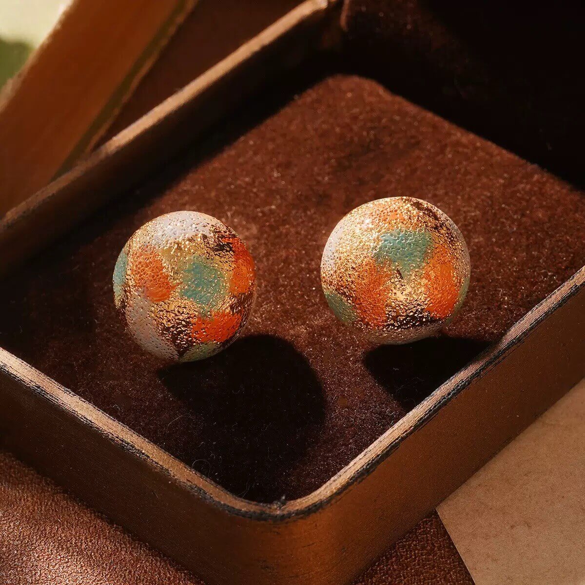 Vintage gold earrings with hand-painted rose artwork in ornate frame design, ideal Christmas jewelry gift.