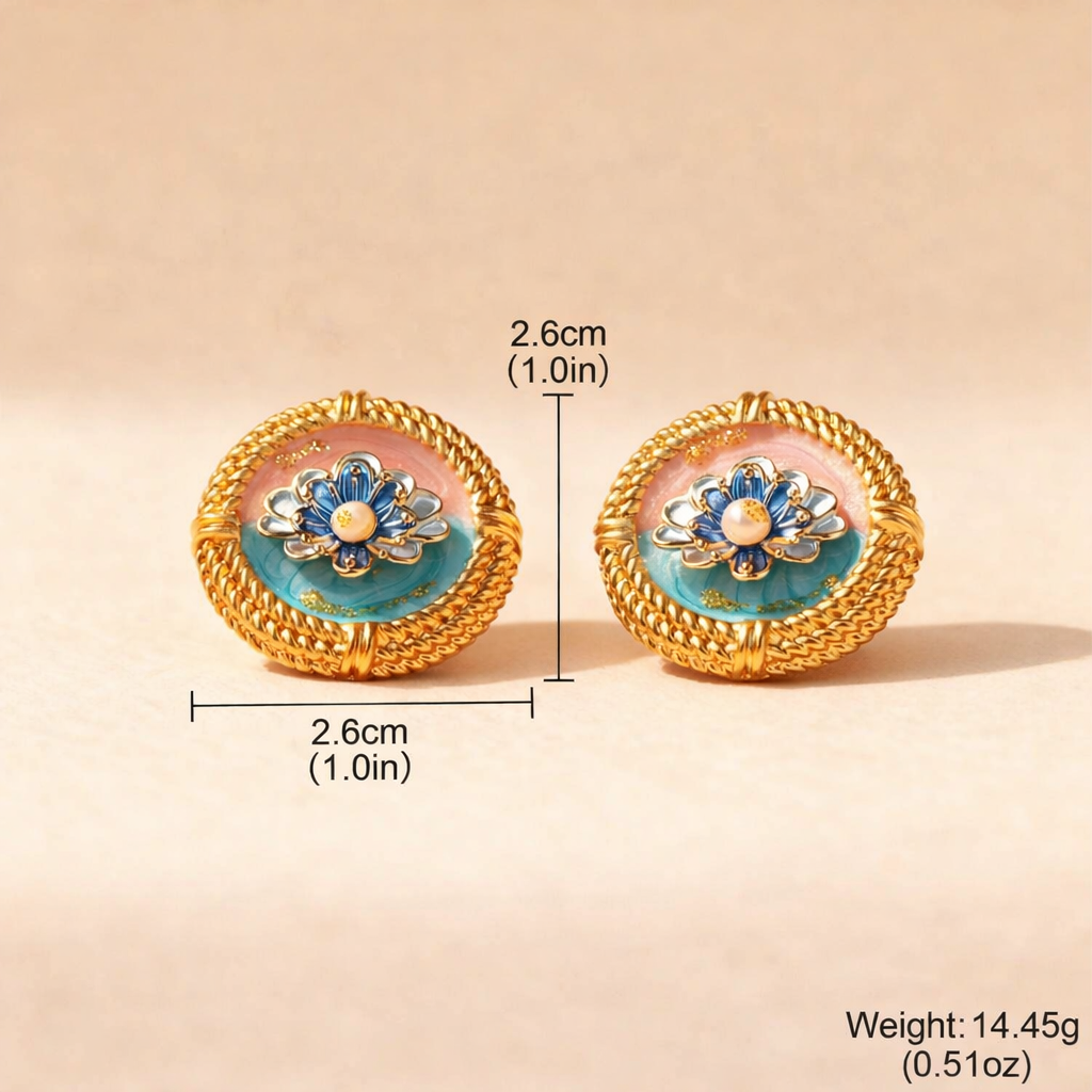 Pair of gold earrings with floral design on a beige background, showing measurements and weight.