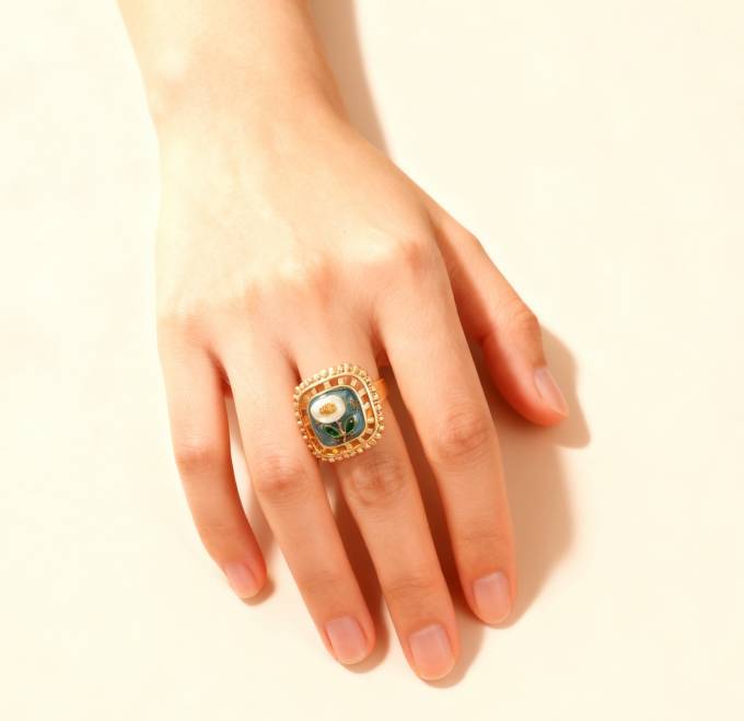 Elegant gold ring with pearl blossom motif, Christmas gift inspiration.