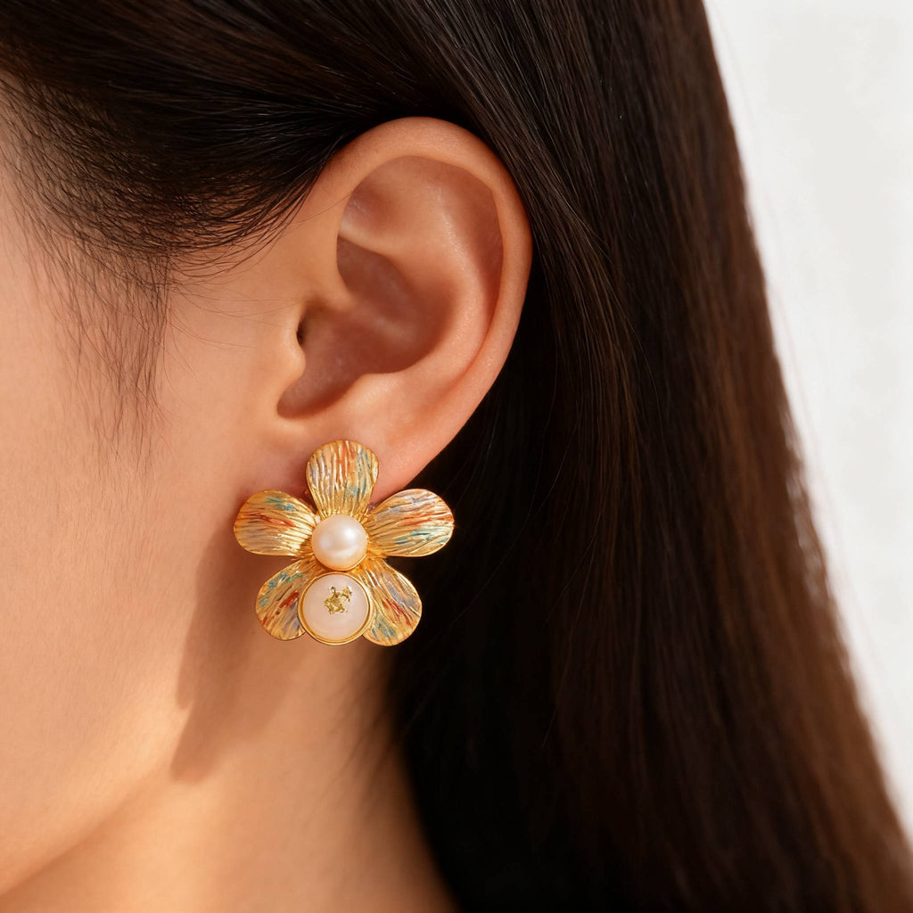 Vintage-style gold flower stud earrings for women with pearls