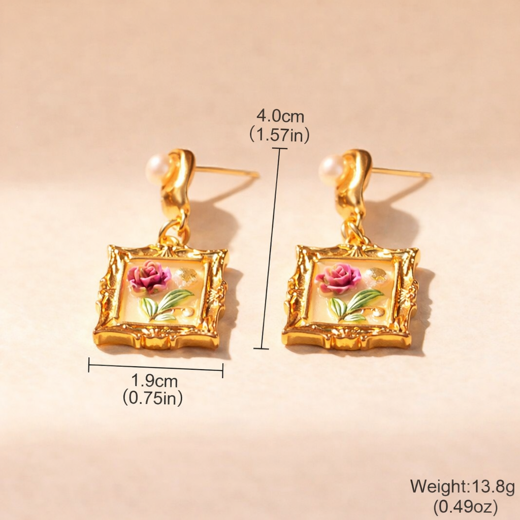 Gold-framed earrings with floral design, shown with measurements on a beige background.