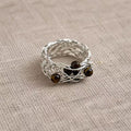 Handcrafted metal Nest ring with a woven wire structure, designed for modern urban women.