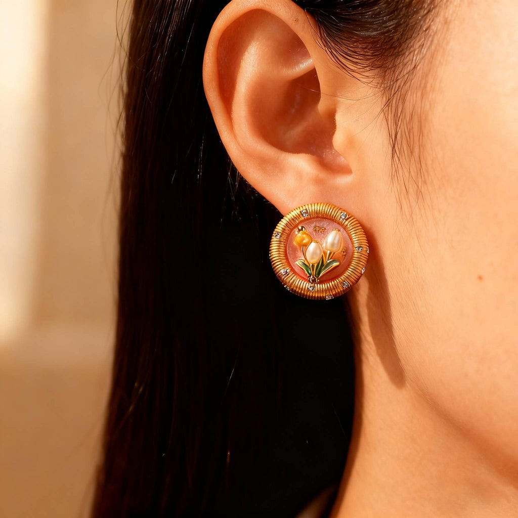 Vintage-style tulip pearl earrings with enamel floral design.