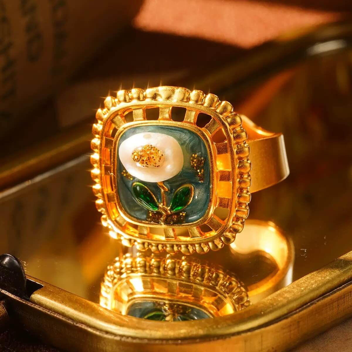 Handcrafted gold ring with pearl flower design, holiday gift idea.