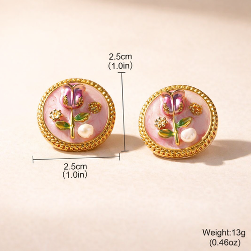 Pair of floral earrings with gold accents and pink background, shown with measurements and weight on a beige background.
