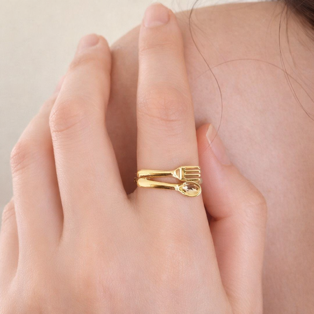 Conceptual cutlery art ring featuring fork and spoon form, unisex statement jewelry with sculptural and minimalist design
